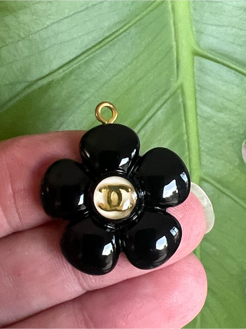 CHANEL Black Camellia Flower Pendant with Gold-Tone CC Center